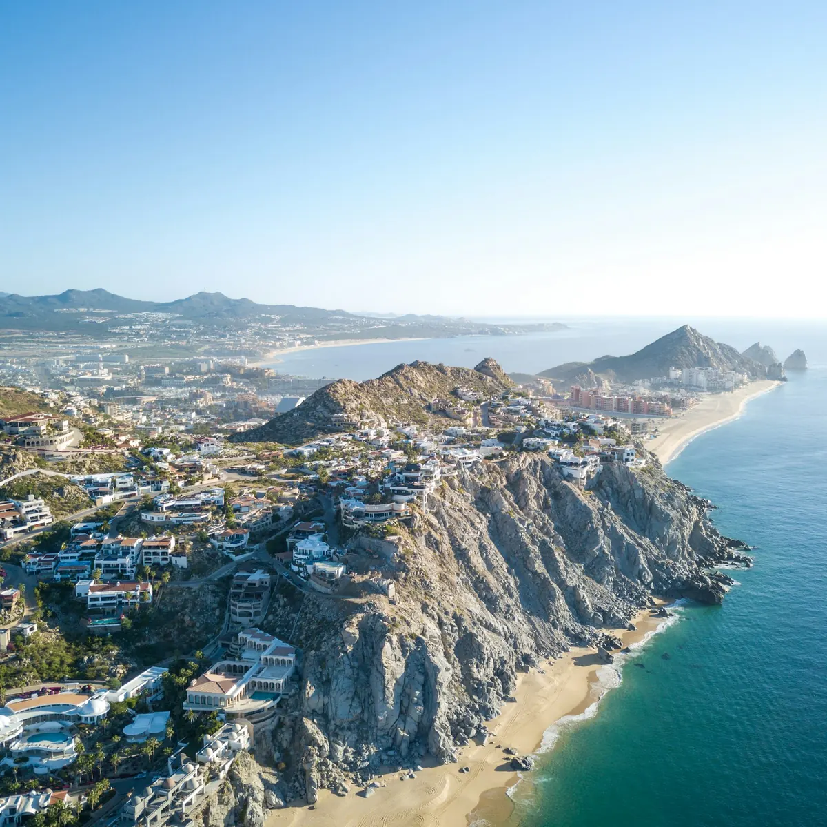 Aerial view of the Los Cabos coastline and resorts