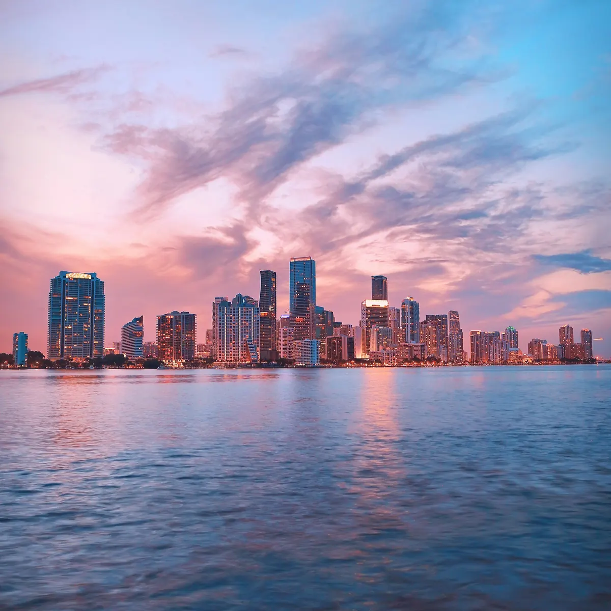 Miami skyline reflected in the bay at sunset